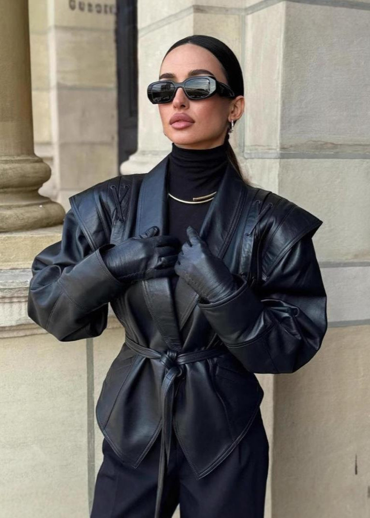 Sylvie - Women's blazer in black faux leather with tie belt and shoulder details