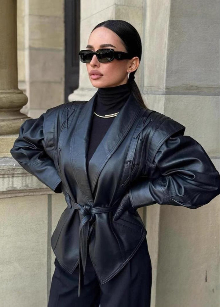 Sylvie - Women's blazer in black faux leather with tie belt and shoulder details